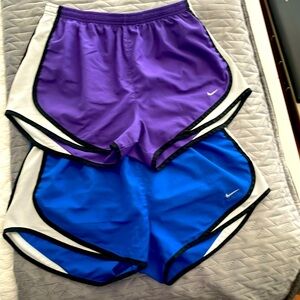 2 pairs of women’s Nike athletic/running shorts